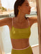 Swim-Club by Sapir Avisror's Touchחזיית בגד ים בגזרה מעט יותר ארוכה.שילוב של רצועות מתכוונות בחלק האחורי.הפריט ללא ריפוד נשלף וללא פתח להכנסת ריפוד.לוגו טביעת אצבע בגב הפריט.הוראות כביסה - יש לכבס בכביסה ידנית בלבד.גוון ירוק עם קונטרסט ורוד.כל חלק נמכר בנפרד.לתשומת לבך - אין להסיר את מדבקת ההייגינה, במידה ותוסר לא ניתן יהיה לבצע החלפות/החזרות.