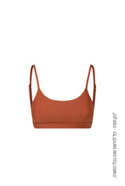 טופ מבד 4 כיוונים בשילוב רצועות מתכוונות, וריפוד נשלף בגוון חמרה, מהסדרה בעיצובה של עינב כהן