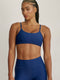 FABRIC: 4 WAY STRETCH FABRIC.טופ מבד 4 כיוונים המתקדם ביותר שלנו, אשר מאופיין באלסטיות ניכרת לאורך כל ארבעת הצירים הראשיים, הבגד עוקב בצורה מושלמת אחר תנועות הגוף ומבטיח חופש פעולה מירבי.גזרה קלאסית קצרה ומחמיאההטופ בשילוב רצועות מתכווננות בגב הטופ.הטופ בשילוב ריפוד נשלף.גוון כחול כהה.