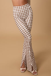 קולקציה בעיצובה של אדל בספלוב - טייץ מתרחב עם שסע/ פתח בסיומת - הדפס משבצות שחור - לבן.