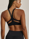 FABRIC: 4 WAY STRETCH FABRIC.טופ מבד 4 כיוונים המתקדם ביותר שלנו, אשר מאופיין באלסטיות ניכרת לאורך כל ארבעת הצירים הראשיים, הבגד עוקב בצורה מושלמת אחר תנועות הגוף ומבטיח חופש פעולה מירבי.גזרה קלאסית קצרה ומחמיאה.הטופ בשילוב כתפיות דקות ורצועות מחמיאות בגב.הטופ עם ריפוד נשלף.גוון שחור.הגוון השחור של הטופ לא בהכרח תואם באופן מלא לגוון השחור של הטייץ.