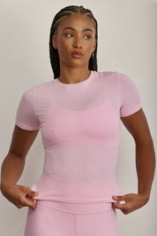 MADE FOR EVERYDAY WEAR, COTTON + חולצת שרוול קצר מבד כותנה, מתאימה לפעיליות היומיומית.נעימה מאוד ומחמאיה, גזרה צמודה. החולצה אינה מבד מנדף זיעה.צווארון עגול סגור.לוגו Z בגב הפריט. גוון ורוד (לא אטום). לתשומת לבך - מפני שמדובר בבד שונה, הגוון אינו תואם לפריטי הספורט.