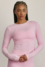MADE FOR EVERYDAY WEAR, COTTON + חולצת שרווך ארוך מבד כותנה, מתאימה לפעיליות היומיומית.נעימה מאוד ומחמאיה, גזרה צמודה. החולצה אינה מבד מנדף זיעה.צווארון עגול סגור.לוגו Z בגב הפריט. גוון ורוד (לא אטום).