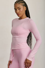 MADE FOR EVERYDAY WEAR, COTTON + חולצת שרווך ארוך מבד כותנה, מתאימה לפעיליות היומיומית.נעימה מאוד ומחמאיה, גזרה צמודה. החולצה אינה מבד מנדף זיעה.צווארון עגול סגור.לוגו Z בגב הפריט. גוון ורוד (לא אטום).