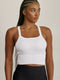 Z RIBBED TANKטופ ריב בגזרת קרופ מבד עם טקסטורת פסי ריב.ריפוד נשלף לנוחות והתאמה אישית.רצועות מתכוונות בגב הפריט להתאמה. לוגו Z מחזיר אור בגב הפריט.גוון לבן.