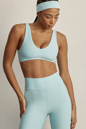 טופ מבד 4 כיוונים מהקולקציה בעיצובה של אדל בספלוב בגוון תכלת ice - הטופ ללא ריפוד נשלף 